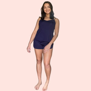 front view of woman with brown hair  wearing a black bamboo cami set especially designed for menopause relief from hot flashes and night sweats variant::navy