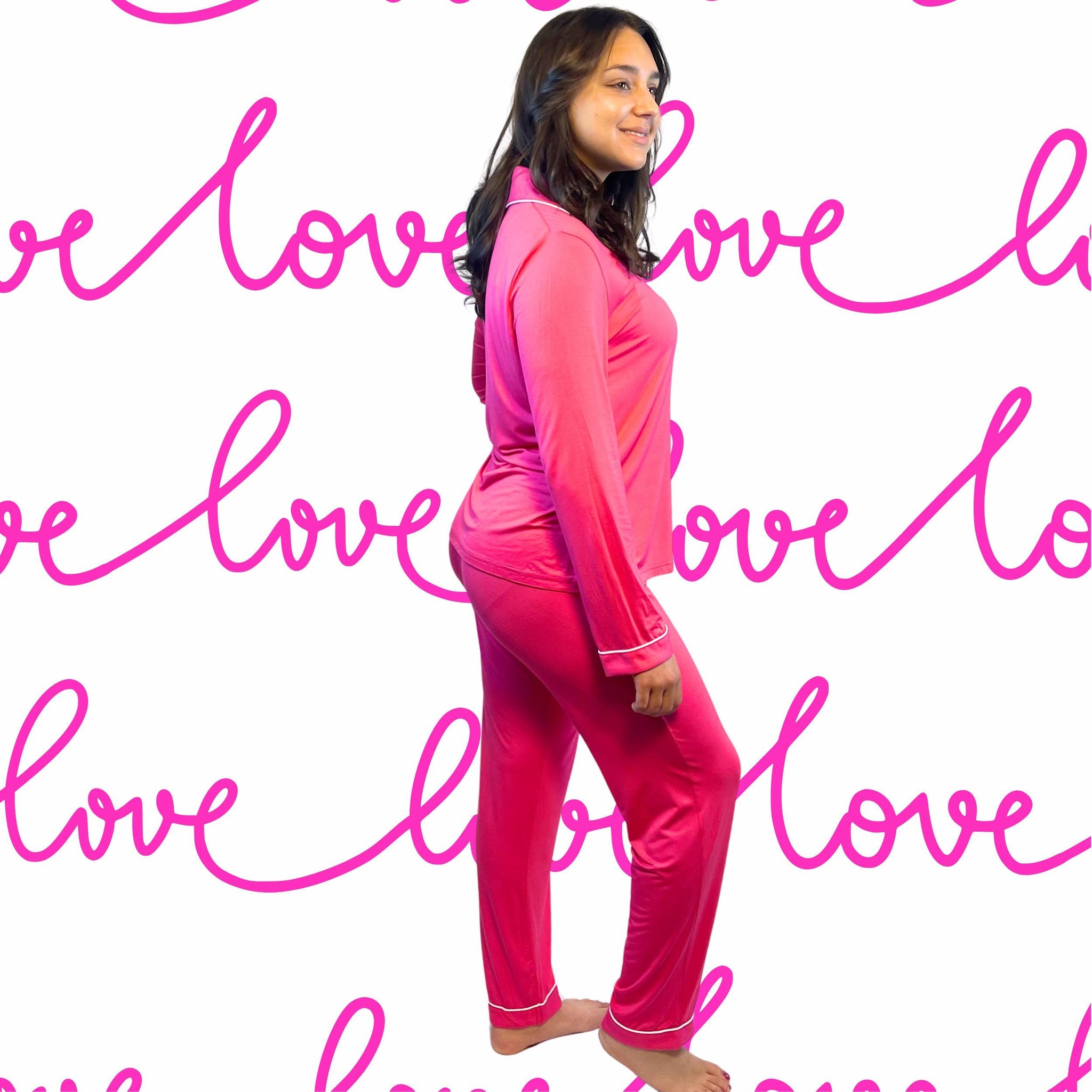 Valentine&#39;s Day Fuchsia Long Bamboo Pajamas modeled by a young woman with shoulder-length dark hair.