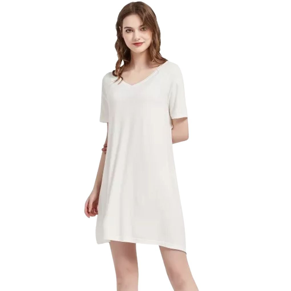 Woman in her 50's in a Bamboo Nightshirt/ Nightgown in Cream, White background variant:: cream
